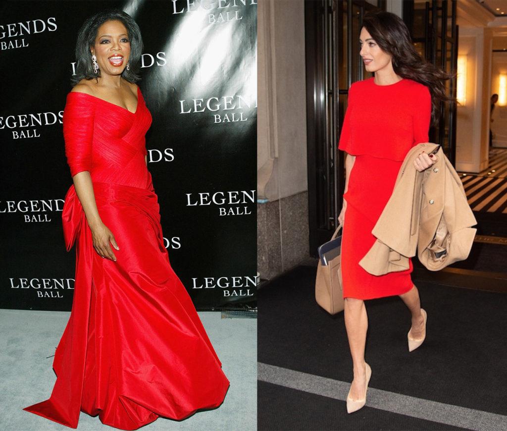 Oprah and Amal in red dresses