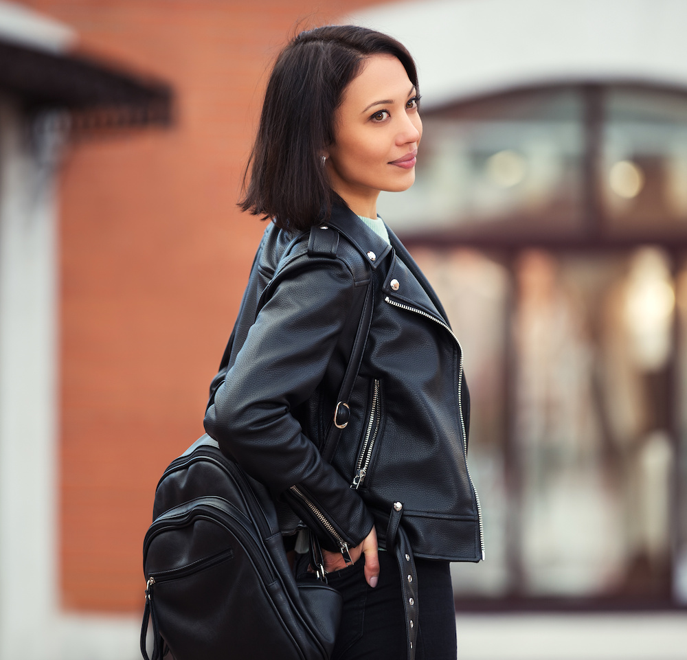 Stylish woman in black jacket