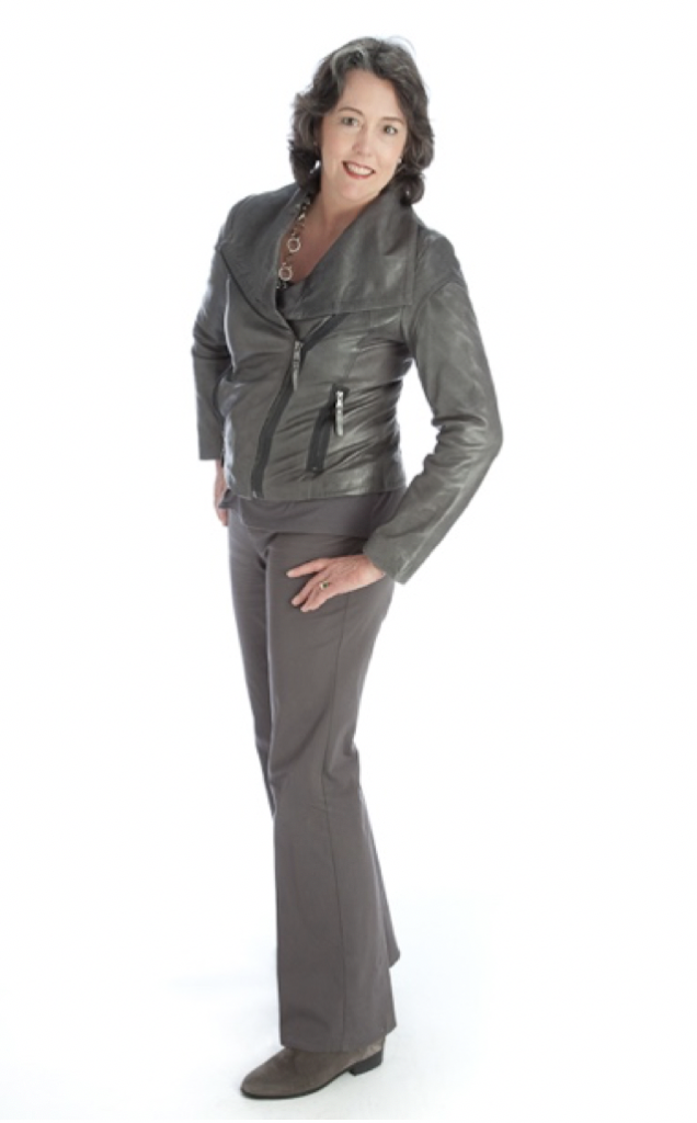 Mary Lou Manlove modeling a gray jacket.