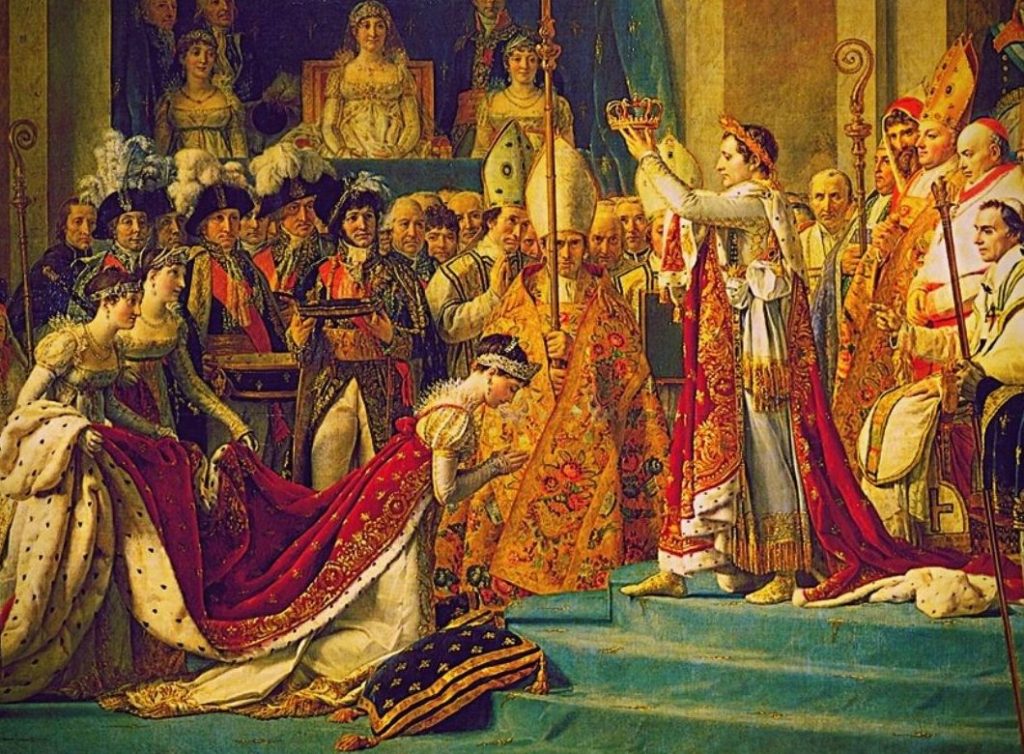 The French emperor Napoleon crowning Josephine wearing red robes.